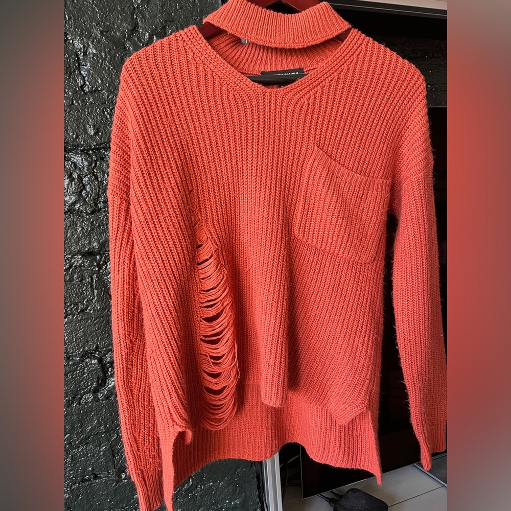 Women size M orange cutout sweater